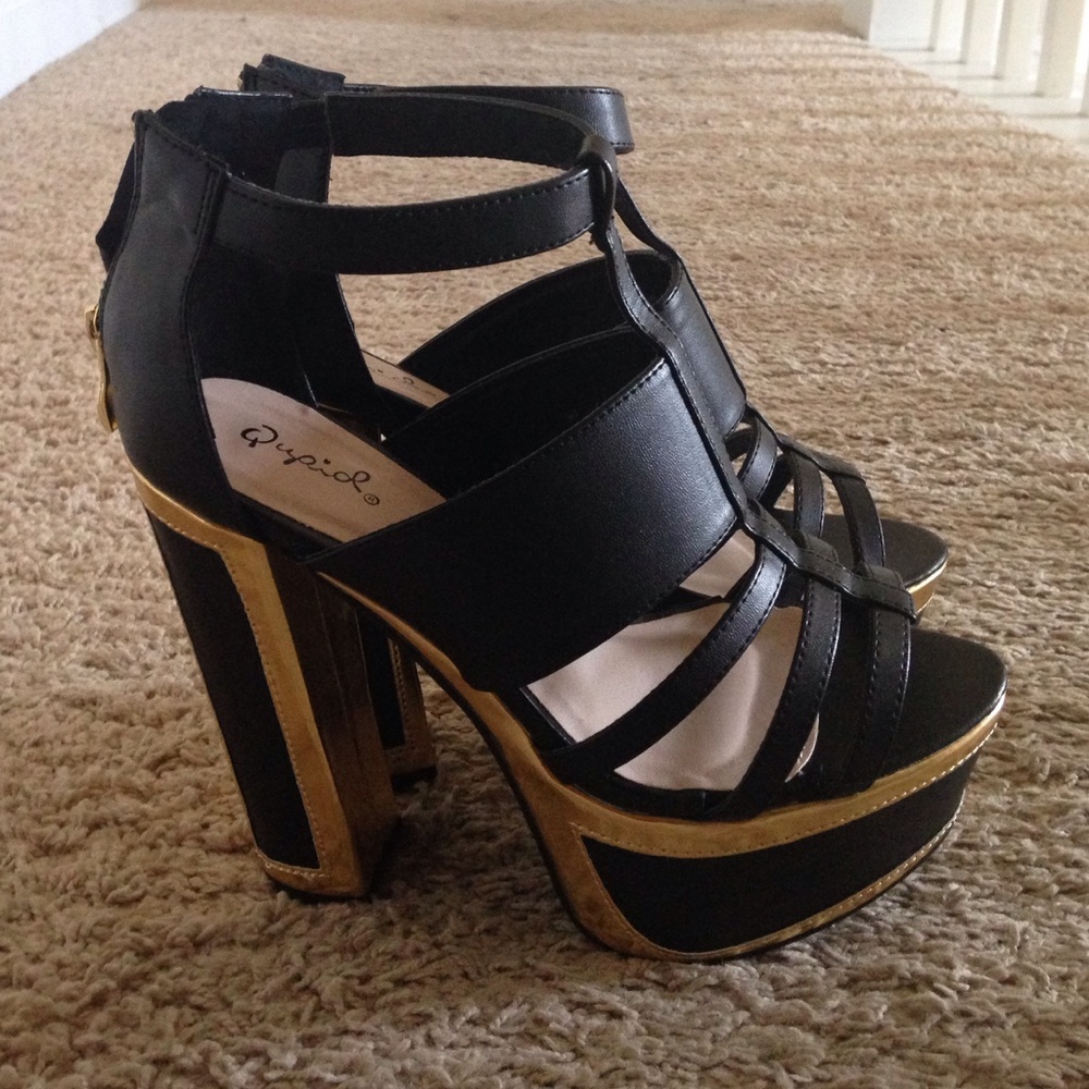 Black and gold platform heels